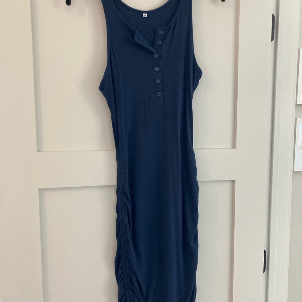 Ribbed, jersey knit material with ruching, tie hem.